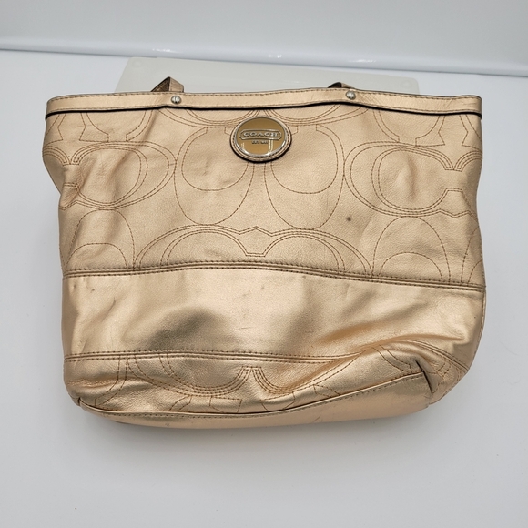 Coach Handbags - Coach Metalic Gold Bucket Medium Tote Shoulder bag Spots on Front Hangtag